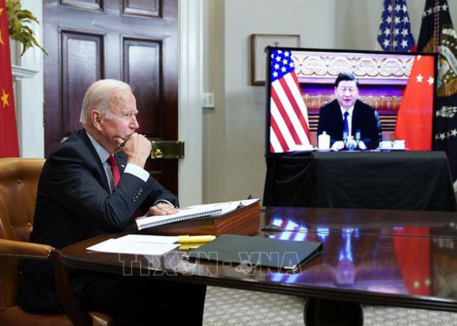 Tổng thống Mỹ Joe Biden (trái) và Chủ tịch Trung Quốc Tập Cận Bình trong cuộc điện đàm ngày 15/11/2021. Ảnh tư liệu
