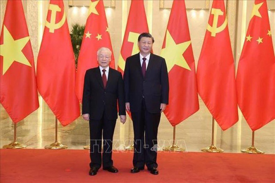 Tổng Bí thư Nguyễn Phú Trọng và Tổng Bí thư, Chủ tịch Trung Quốc Tập Cận Bình chụp ảnh chung. 