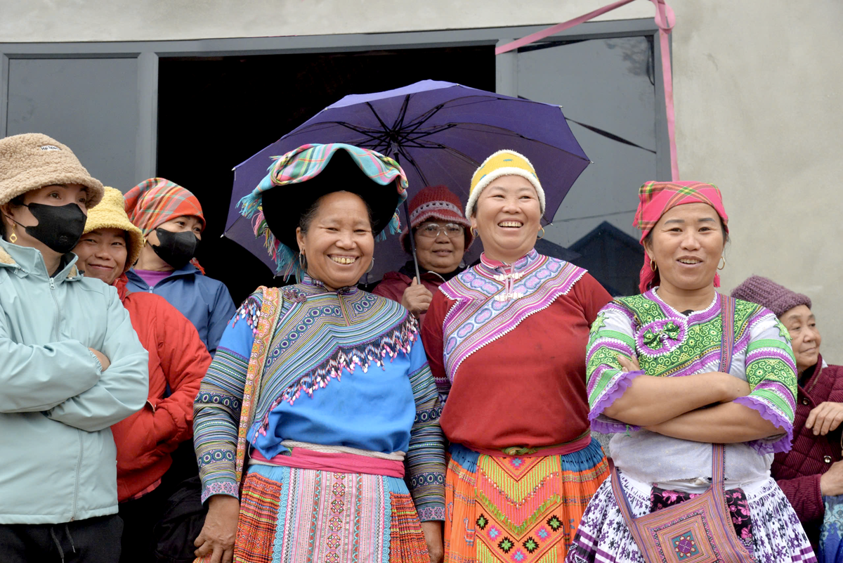 The radiant smiles of people in the Dong Tam resettlement area.