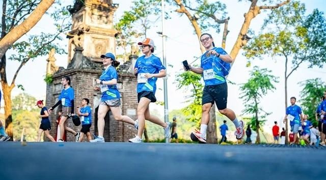 Runners compete in the Standard Chartered Hanoi Heritage Marathon 2024