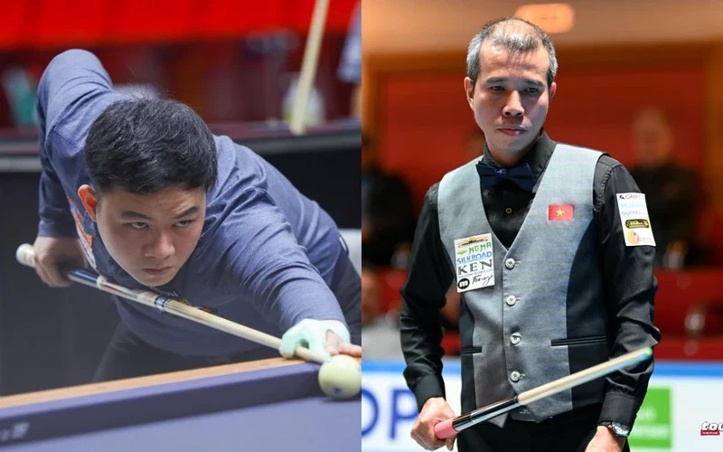 Vietnamese billiards players Bao Phuong Vinh (L) and Tran Quyet Chien compete at the 2025 World Championship 3-Cushion National Teams in Viersen, Germany.