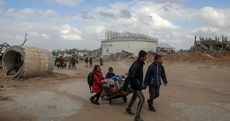 Người dân sơ tán tránh xung đột tại Beit Lahia, Dải Gaza, ngày 20/3. 