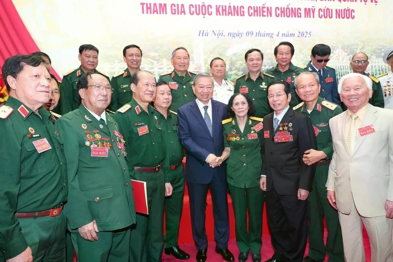 Party General Secretary To Lam receives war or peace, war veterans, former youth volunteers and militia members in Hanoi on April 9