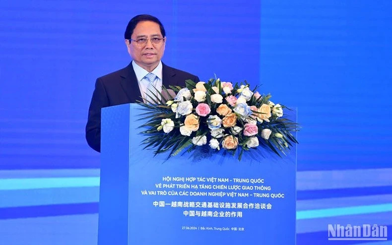 Vietnamese Prime Minister Pham Minh Chinh speaks at the conference in Beijing on June 27