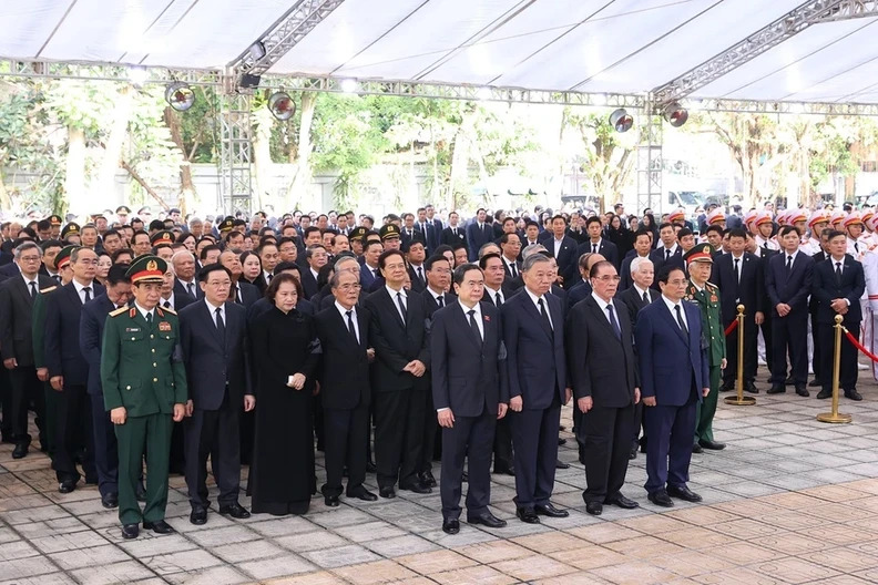 The delegation of the Central Committee of the Communist Party of Vietnam, led by Politburo member and President To Lam prepares to pay respects to General Secretary Nguyen Phu Trong.