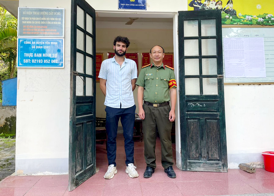 The French tourist receives his documents and personal belongings back.