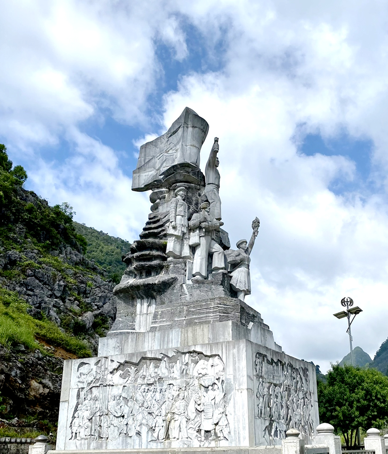 A monument to young volunteers who built the Happiness Road.