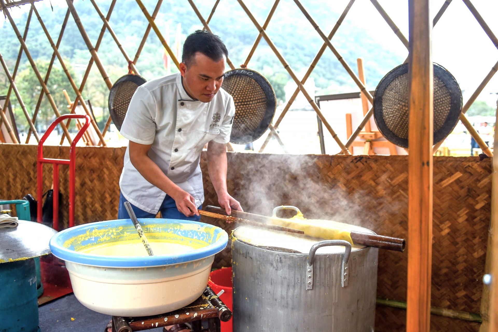 The corn flour is then spread, dried, and hung on long bamboo rods placed high up.