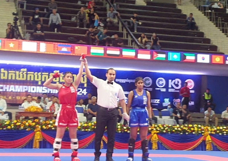 Kickboxer Phung Thi Hong Tham secures the 11th gold medal for the Vietnamese team.