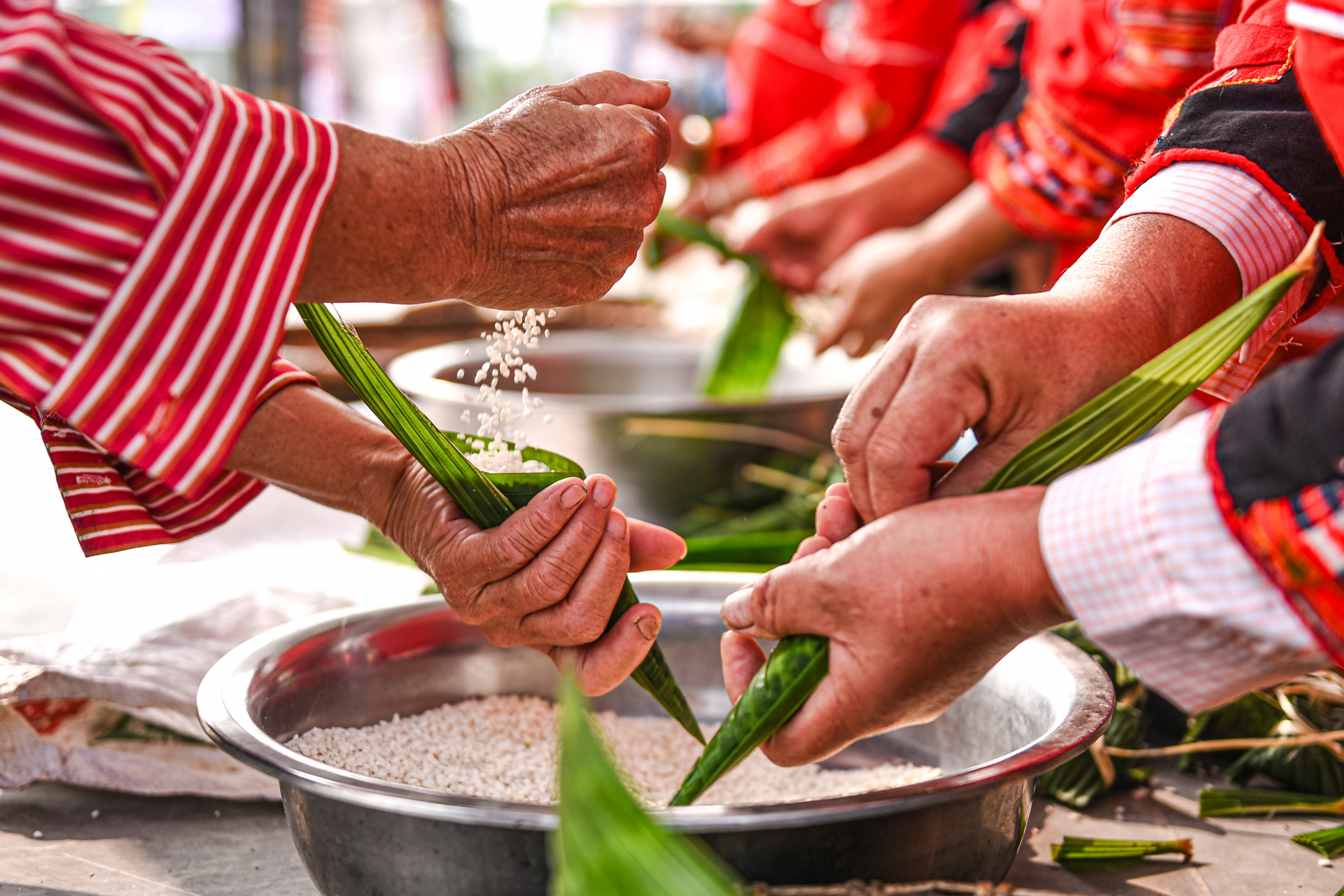 Traditional cuisine is represented through banh sung trau, a delicacy typically prepared for festivals, Lunar New Year, or significant community events.