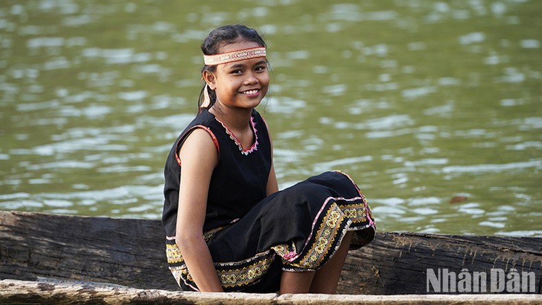 The beauty of a Ba Na child on the poetic Dak Bla River.