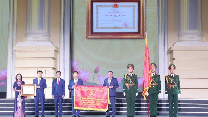 The ceremony to mark the 100th founding anniversary of Son Tay Town.