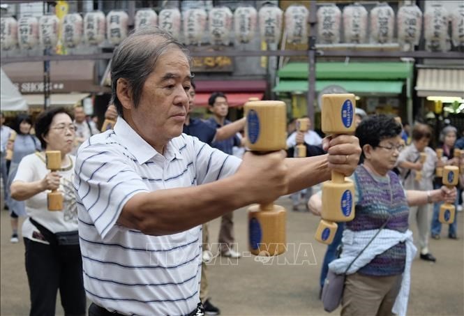 Elderly taking part in morning exercise in Tokyo